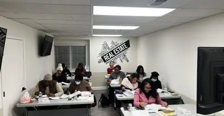 Students participating in an in-person real estate class